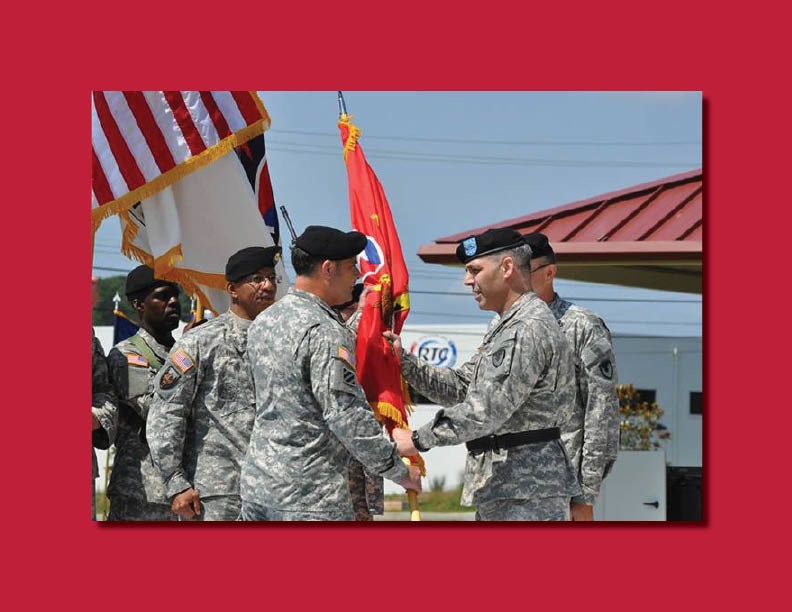 Major General Gustave F. Perna, right, AMC’s Deputy Chief of Staff (G-3/4) passes the guidon to Colonel Salvo at AMC Headquarters.